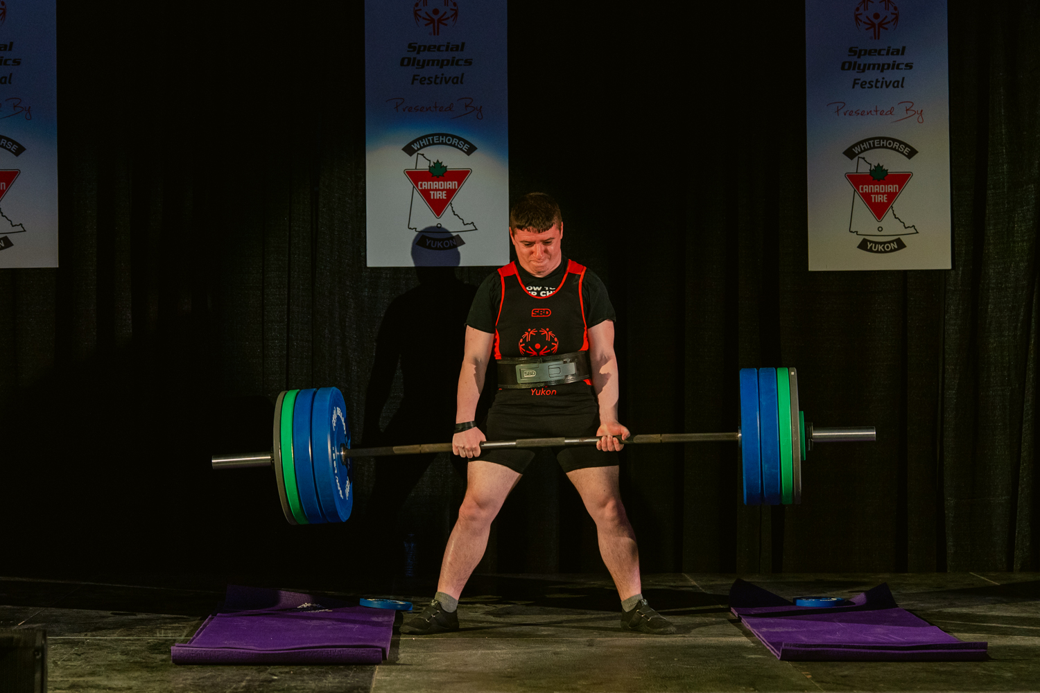Brandle competing in powerlifting at a Special Olympics event. Brandle competing in powerlifting at a Special Olympics event.