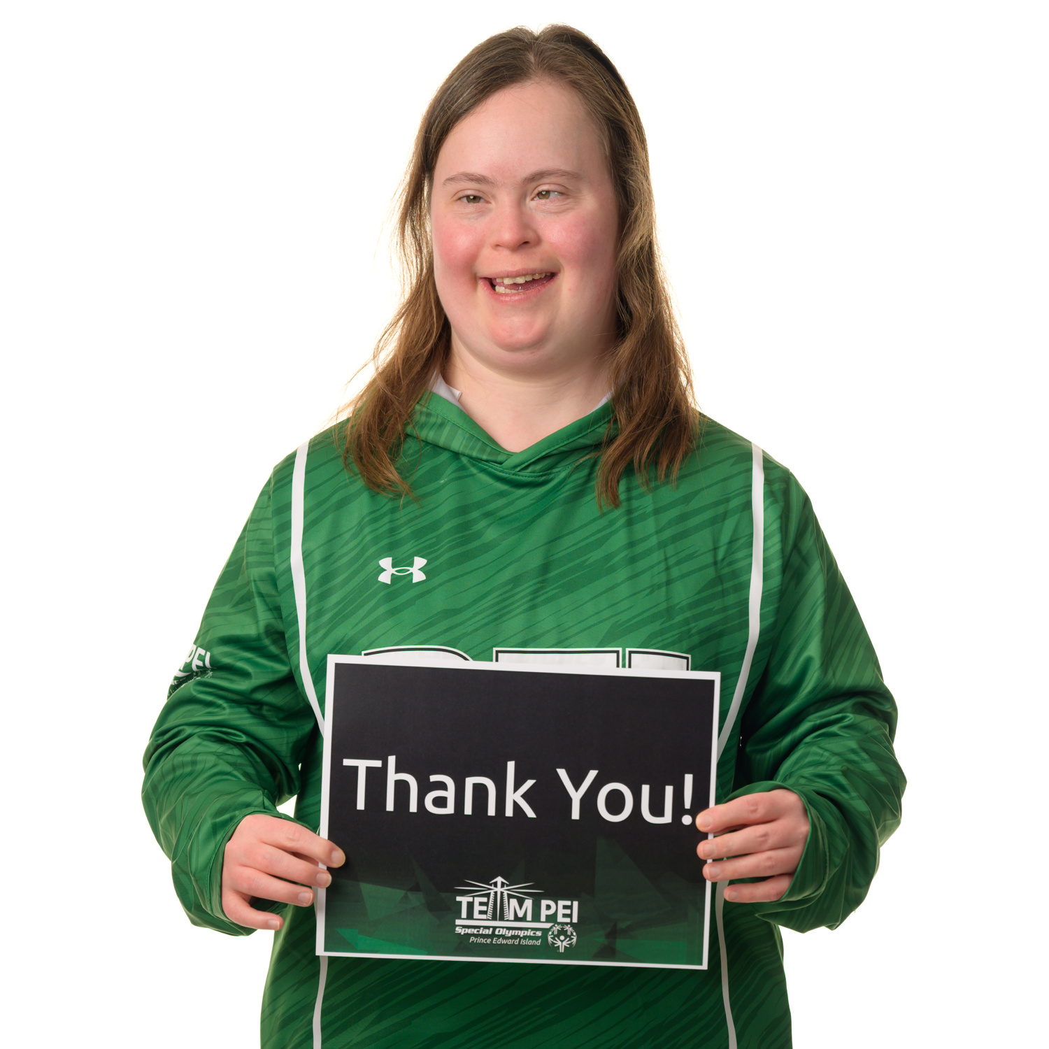 Team PEI 2026 Basketball athlete, Rachael Loggie, holding a thank you sign