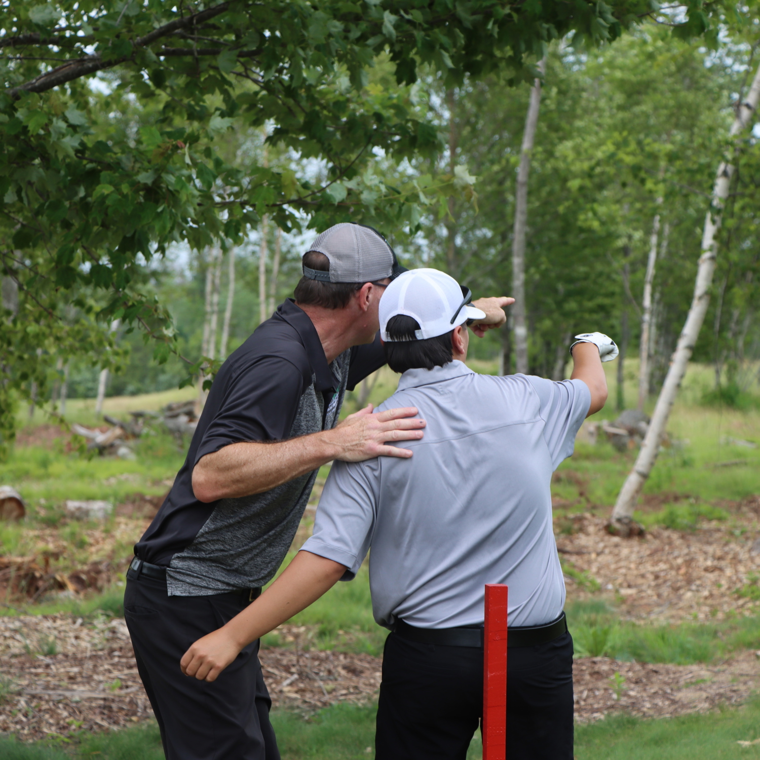 Golf Athlete and their coach