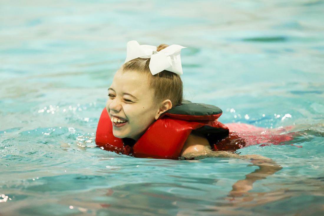 Sophia swimming at the pool. 