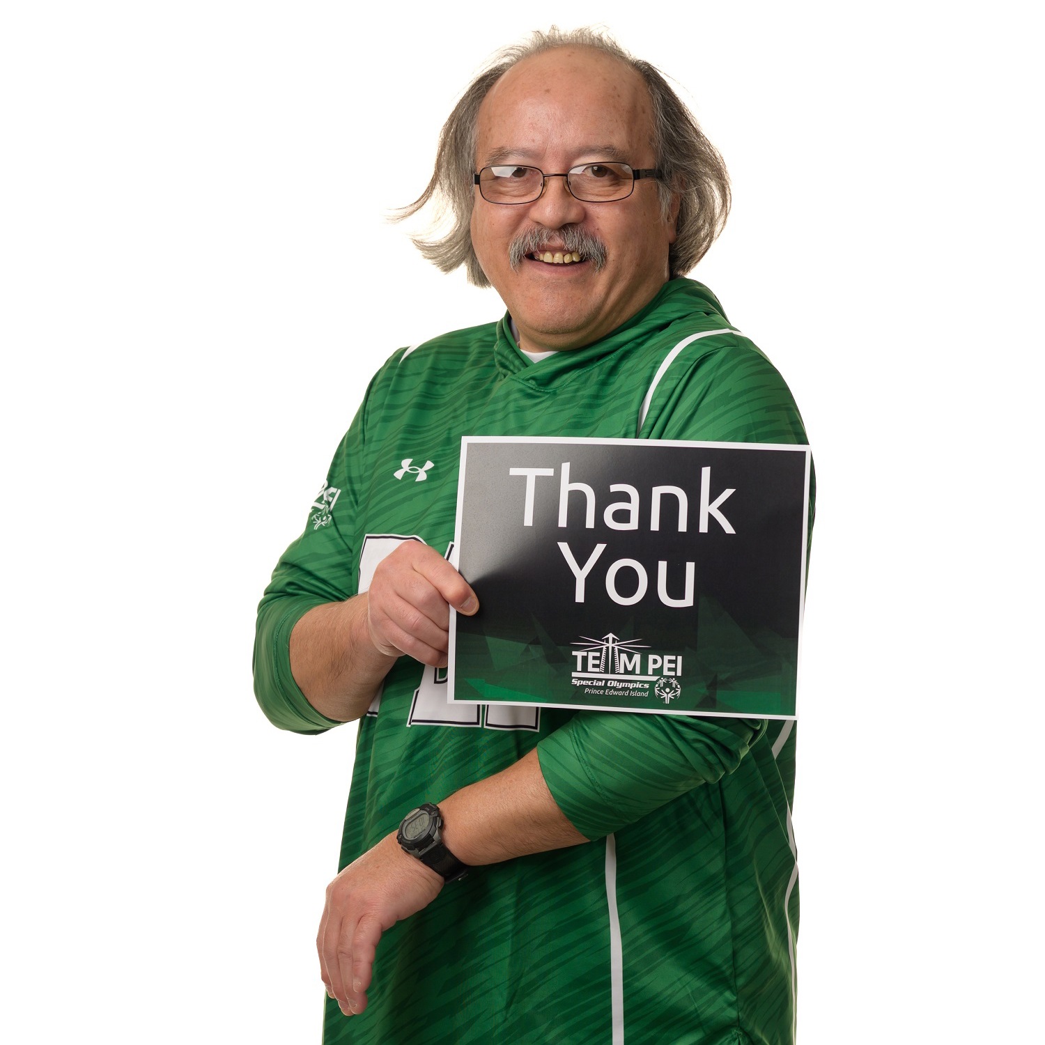 Team PEI 2026 Bocce athlete, Tommy Ling with a thank you sign