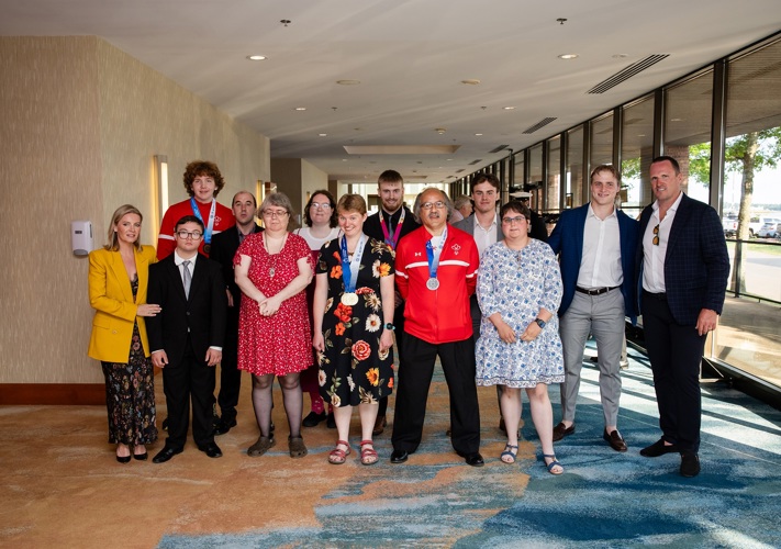 Group of Special Olympics athletes and celebrity guests at the Enriching Lives Gala
