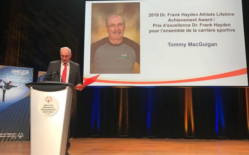 Tommy MacGuigan accepting the Dr. Frank Hayden lifetime achievement award
