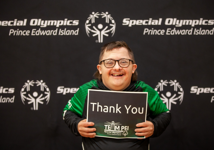 Special Olympics PEI, Athlete with Thank You Sign