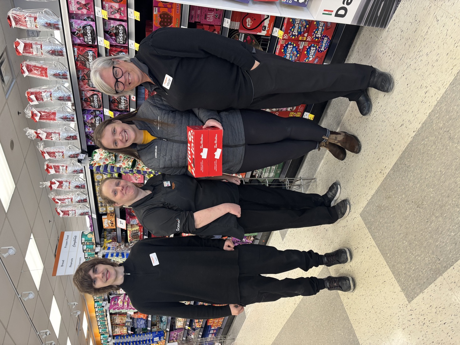 Lisa Murphy with coworkers at Lawtons Drugs.