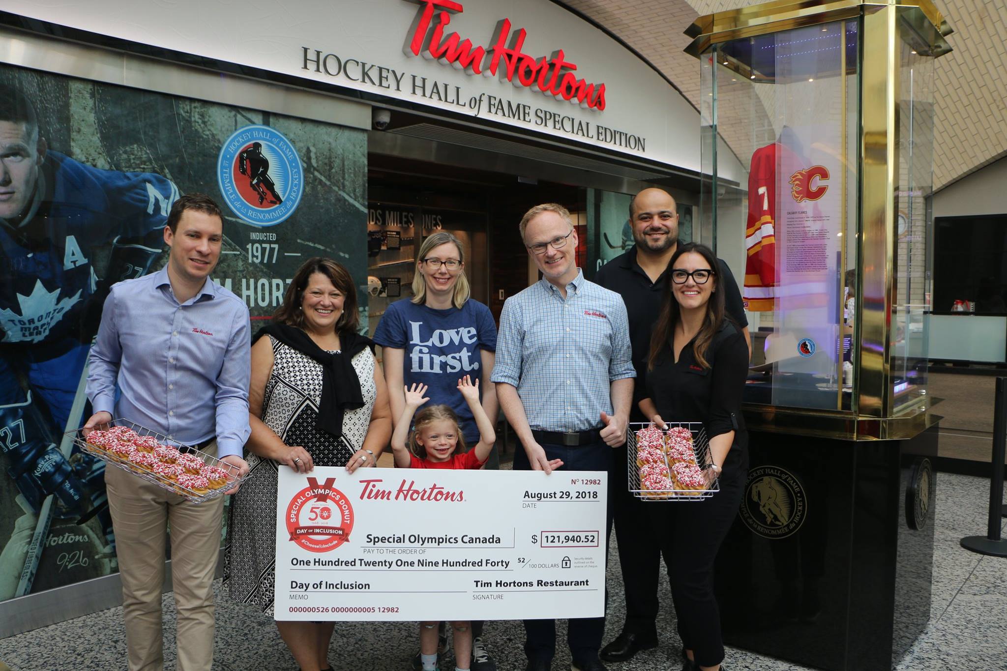 Tim Hortons presents a Day of Inclusion cheque to Special Olympics.