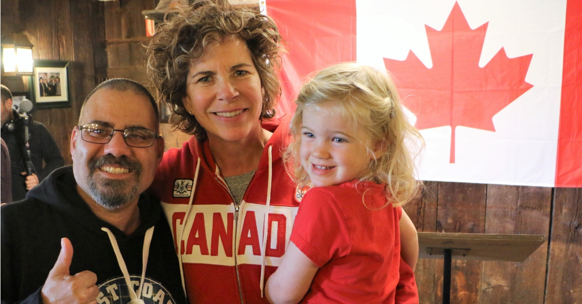 Marnie McBean with daughter Isabel and a Special Olympics Team Canada athlete.