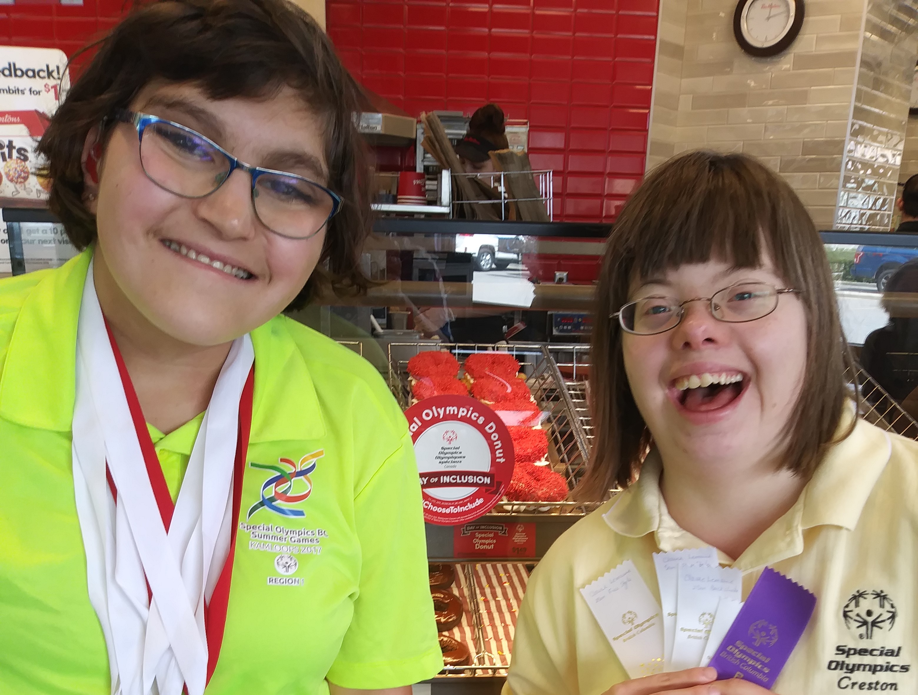 SOBC Athletes Laila Currie and Claire Lemaire at Tim Hortons on the Global Day of Inclusion in 2019