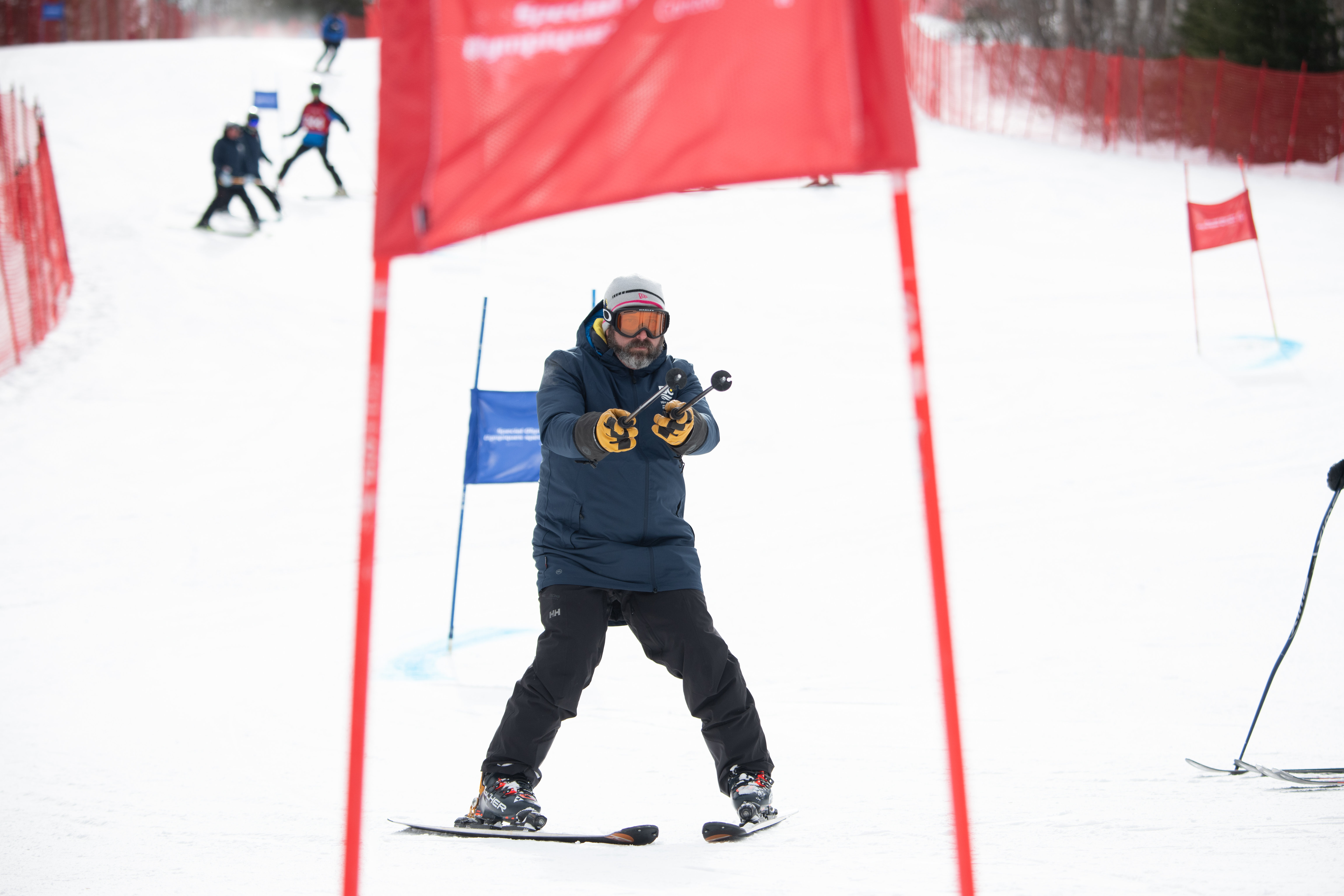 Mark Schnurr skiing down a hill