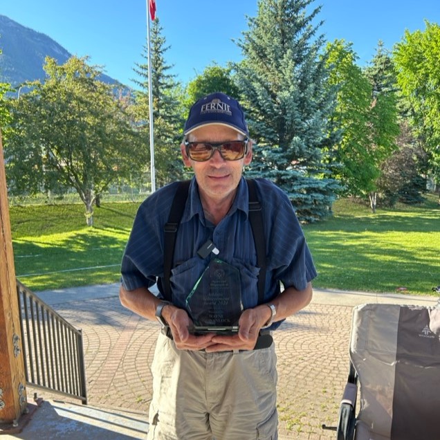 Wayne Gowanlock holds the Spirit of Sport Award