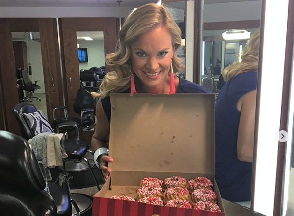 Jennifer Hedger post a picture with a box of Special Olympics Donuts.