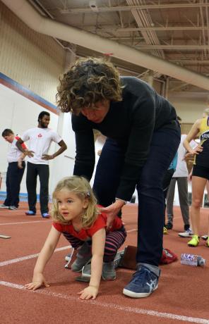 Marnie and daughter Isabel try out some races at Athletics Training Camp.