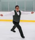 Special Olympics BC figure skater Alex Pang performs on the ice