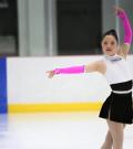 Special Olympics Alberta athlete Meg Ohsada poses on the ice