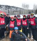 Martin McSween poses for a photo with his ski team.