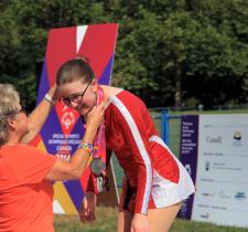 Annick Leger receives a medal at the Special Olympics Canada National Games, Vancouver 2014