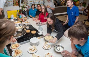 Athletes learn how to make apple nachos at the Family Health Forum in Stratford, PE