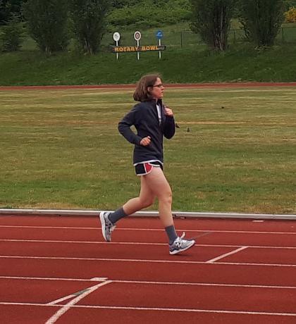 Athlete Miranda Orth running on a track