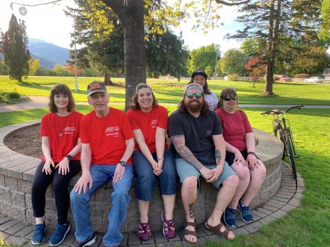 Members of SOBC – Revelstoke Bocce program sitting by a tree for group photo